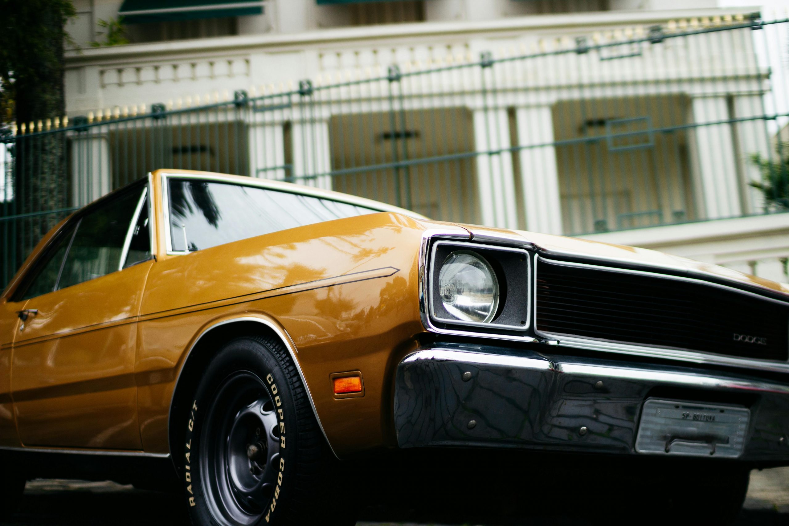 mustard yellow muscle car from the 1960s